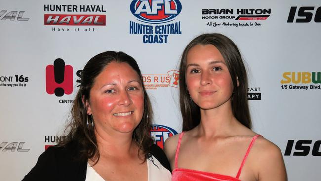 umpires Janelle Biden (left) and Zali Mertens