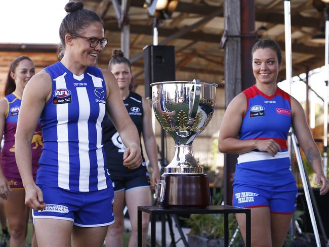 (L-R) Leah Kaslar, Emma Kearney, Bri Davey and Ellie Blackburn are seen during the 2019 AFLW launch in Port Melbourne, Wednesday, January 30, 2019. (AAP Image/Daniel Pockett) NO ARCHIVING