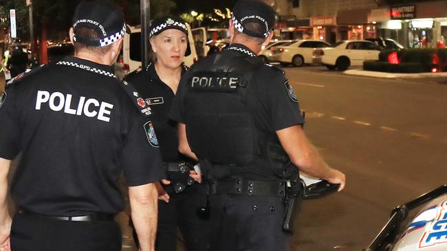 Queensland Police Commissioner Katarina Carroll joins Cairns police officers conducting a wanding operation to search for concealed knives and weapons. Picture: Andrew McKenna.