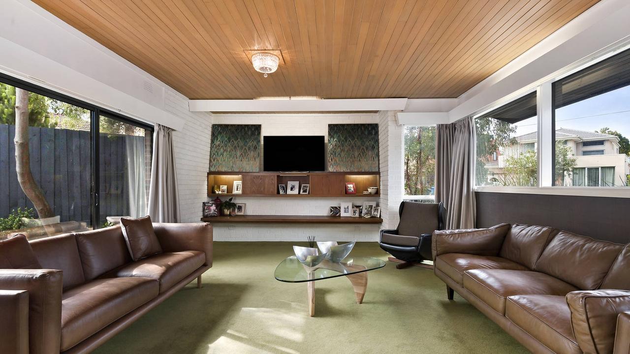 The formal lounge room is still in the modernist style.