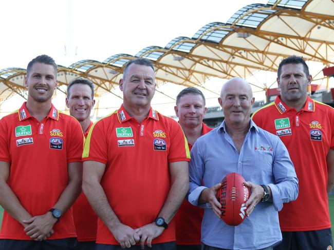 Gold Coast Suns AFLW coaches (from left) Andrew Swallow, Matt Bedford, David Lake, John Taylor, Bruce Coulson (founder of Kool Kids Early Education Centres) and Darryl White. Picture: Supplied.