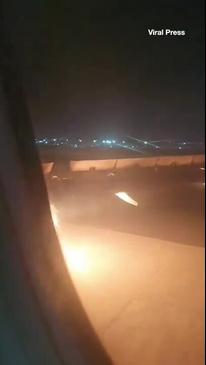 Terrifying moment plane engine catches fire mid-flight