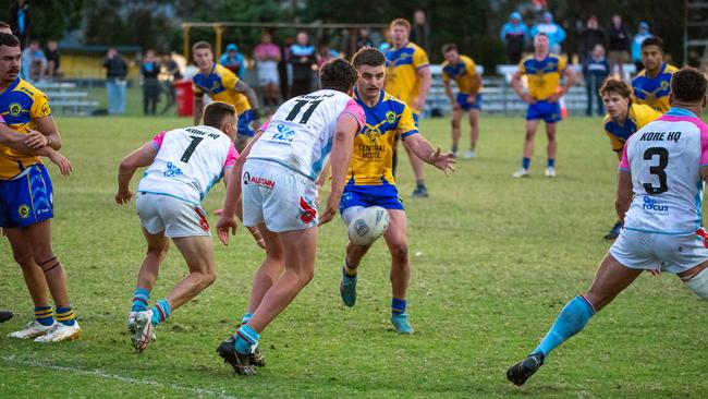 Blair Grant chipping the ball though to the try line. Picture: Thomas Lisson