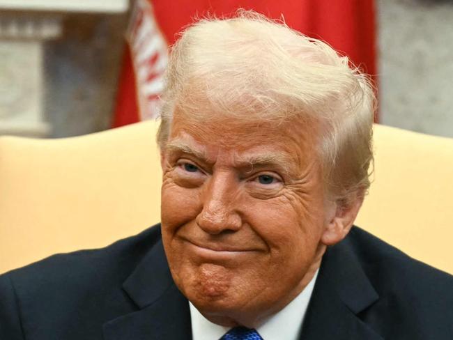 TOPSHOT - US President Donald Trump looks on during a meeting with Japanese Prime Minister Shigeru Ishiba in the Oval Office of the White House in Washington, DC, on February 7, 2025. (Photo by Jim WATSON / AFP)