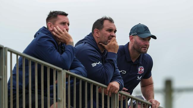 Mitchell Pearce and Boyd Cordner watch the Roosters U19s. Picture: Adam Wrightson Photography