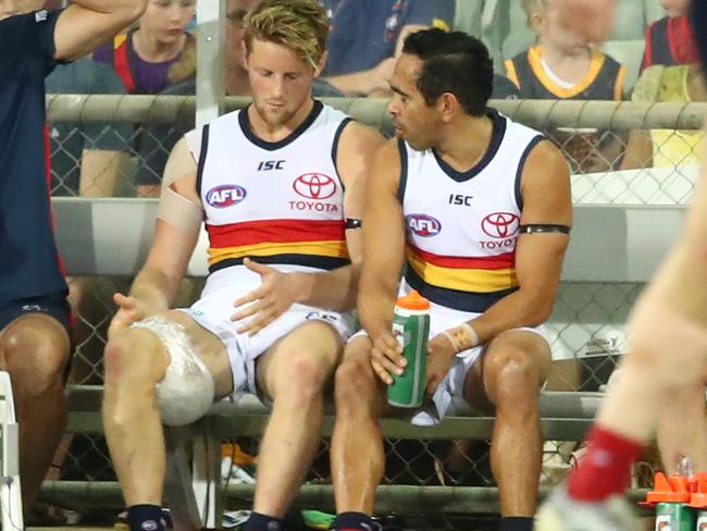 DARWIN, AUSTRALIA - JUNE 01: Rory Sloane of the Crows sits on the bench injured next to Eddie Betts of the Crows during the round 11 AFL match between the Melbourne Demons and the Adelaide Crows at TIO Stadium on June 01, 2019 in Darwin, Australia. (Photo by Scott Barbour/Getty Images)