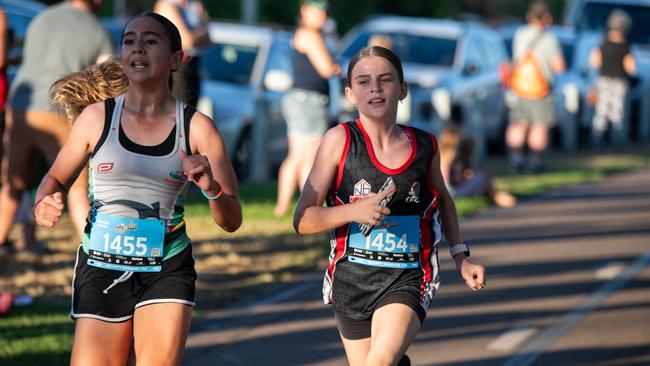 Two 4km runners battling to the finish line. Picture: Pema Tamang Pakhrin.