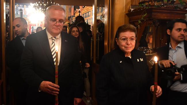 Prime Minister Scott Morrison and Greece Minister of Culture Dr Lina Mendoni at the Greek Orthodox Easter service. Picture: AAP