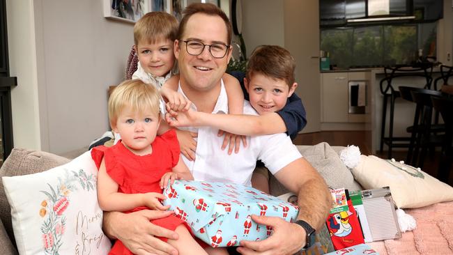 Dad Joseph Du Rieu with kids Reuben, 4, Rachel, 2, and Dominic, 6. Picture: David Caird