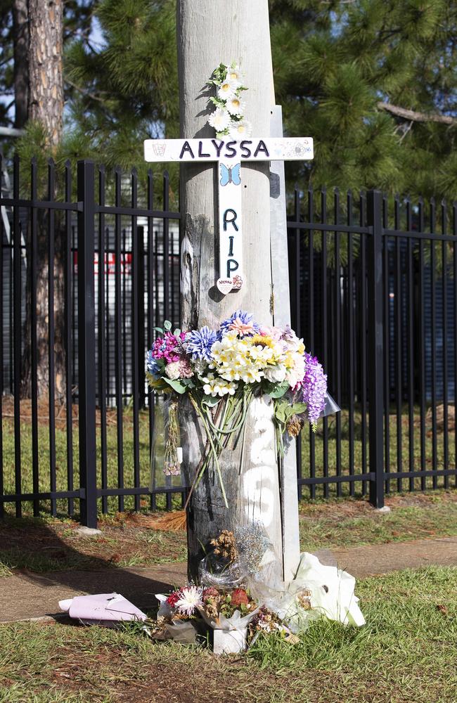 A memorial to Alyssa Postle at the site of the crash on the corner of Lavarack and Old North roads, Warner. Picture: Attila Csaszar.