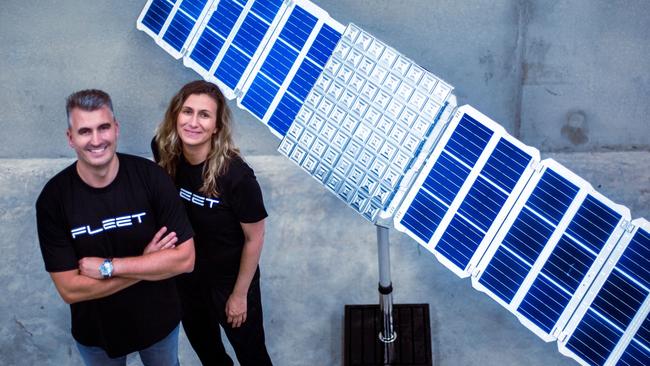 Fleet cofounders Matt Pearson and Flavia Tata Nardini with the 3D-printed small satellite named Alpha. Picture: Supplied