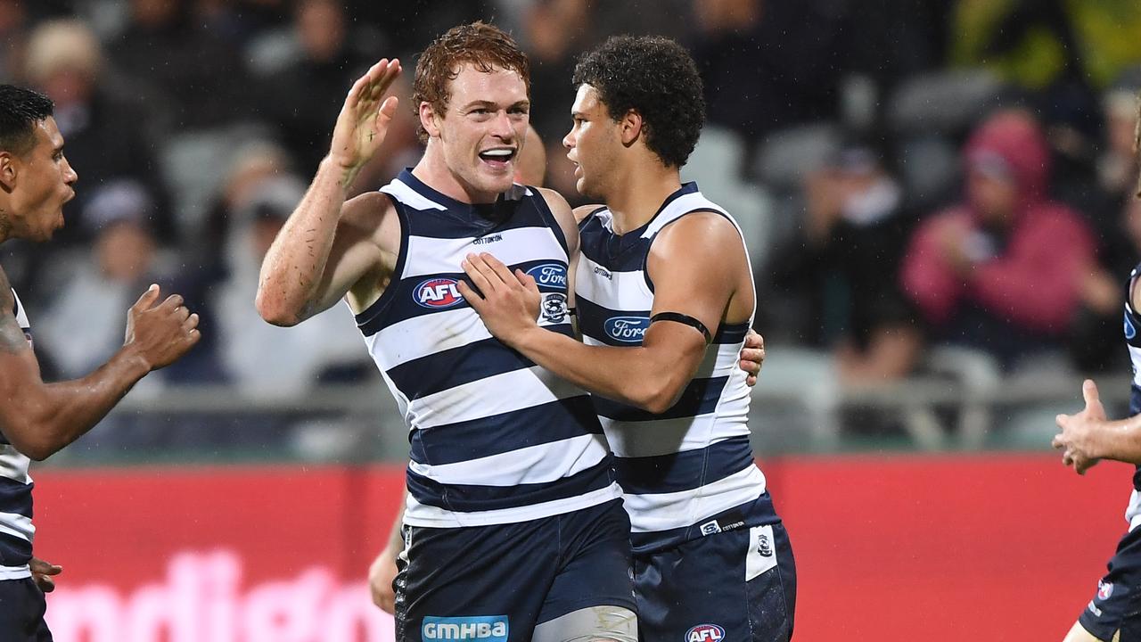 Geelong has delisted 2022 premiership players Gary Rohan (left) and Brandan Parfitt among seven list changes ahead of next season. Picture: Julian Smith / AAP