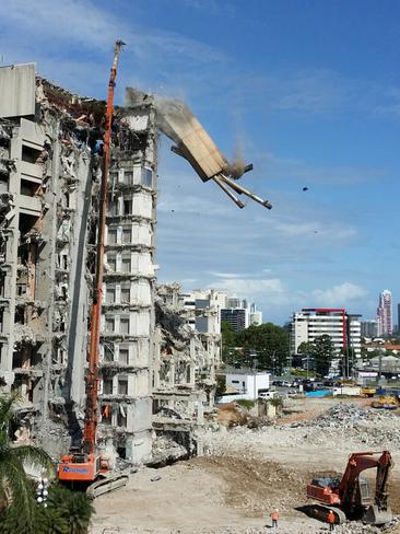 The tower topples from the top of the old Gold Coast Hospital, February 12, 2015. Photo: Dr Neil Cleaver