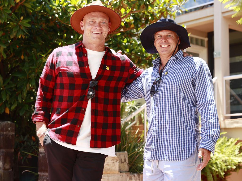 Michael Klim and Brad Hodge are reminding men of the simple steps they need to take to reduce their risk of developing skin cancer. Picture: Tim Hunter