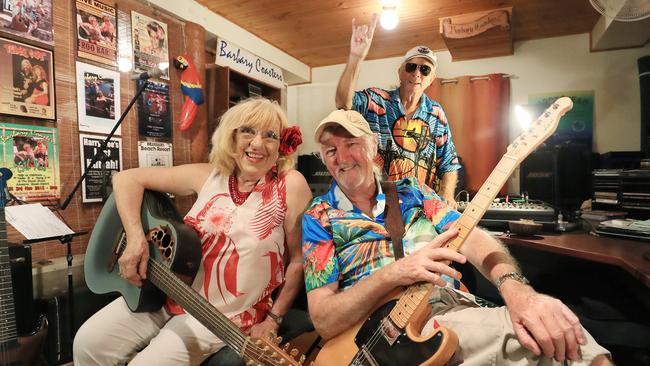 It's 30 years since original band members Nikki Lowmass and Vance Fahey, pictured with drummer Brian Pitcher, first played their Jimmy Buffet tribute show, which has grown into the annual Parrothead Party. Picture: Brendan Radke