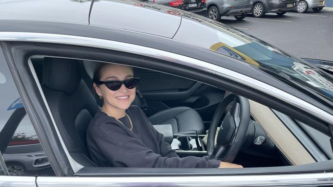 Tesla driver Bella Carrington from Sydney was happy to wait for a charging bay to become available. Picture: Chris Knight