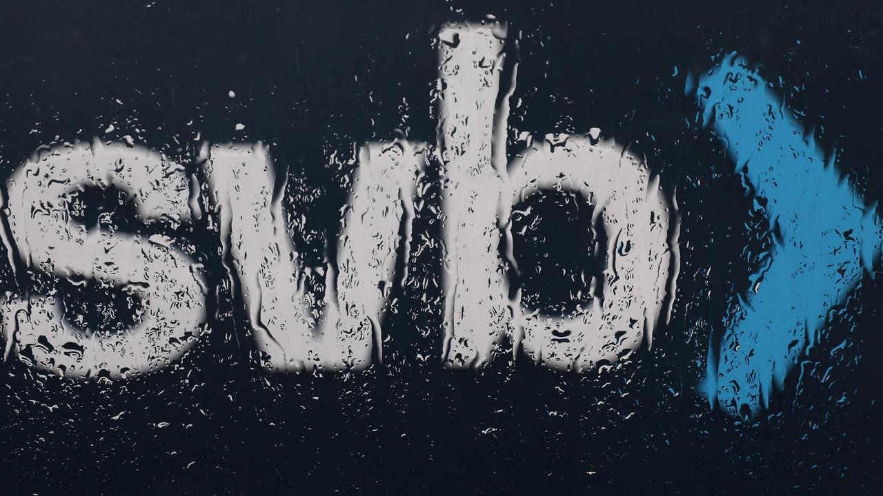 SANTA CLARA, CALIFORNIA - MARCH 10: The Silicon Valley Bank (SVB) logo is seen through a rain covered window in front of the SVB headquarters on March 10, 2023 in Santa Clara, California. Silicon Valley Bank was shut down on Friday morning by California regulators and was put in control of the U.S. Federal Deposit Insurance Corporation. Prior to being shut down by regulators, shares of SVB were halted Friday morning after falling more than 60% in premarket trading following a 60% declined on Thursday when the bank sold off a portfolio of US Treasuries and $1.75 billion in shares to cover declining customer deposits.   Justin Sullivan/Getty Images/AFP (Photo by JUSTIN SULLIVAN / GETTY IMAGES NORTH AMERICA / Getty Images via AFP)