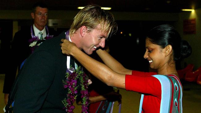 Brett Lee is welcomed after arriving at Bandaranaike International Airport in Colombo, Sri Lanka in 2004.