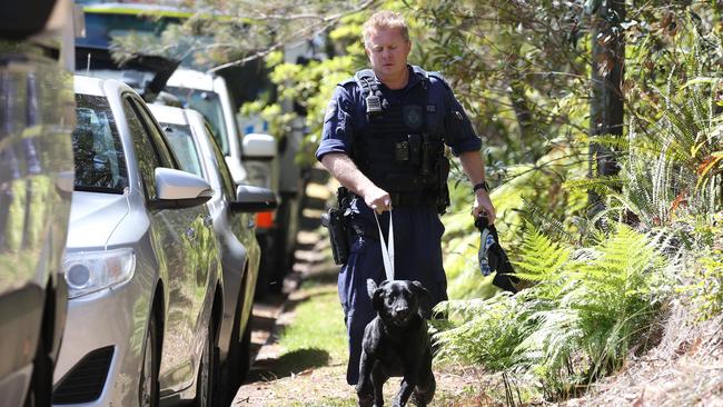 13/09/2018: DAY 2 - A sniffer dog arrives at 2 Gilwinga Dr, Bayview. NSW Police from the NSW homicide squad conduct a forensic search at the home of Lynette Joy Dawson's former home. Hollie Adams/The Australian