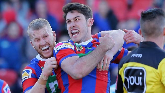 Nick Meaney celebrates scoring a try for the Knights. Picture: Getty Images