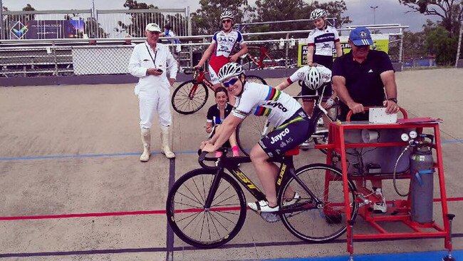 Kenrick Tucker (in white) on track with Anna Meares and some of his Rockhampton charges.