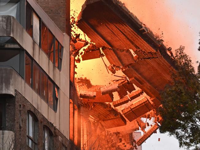 Surry Hills:  A wall collapses during a building fire in the Central Business District of Sydney, Thursday, May 25, 2023. (AAP Image/Dean Lewins) NO ARCHIVING