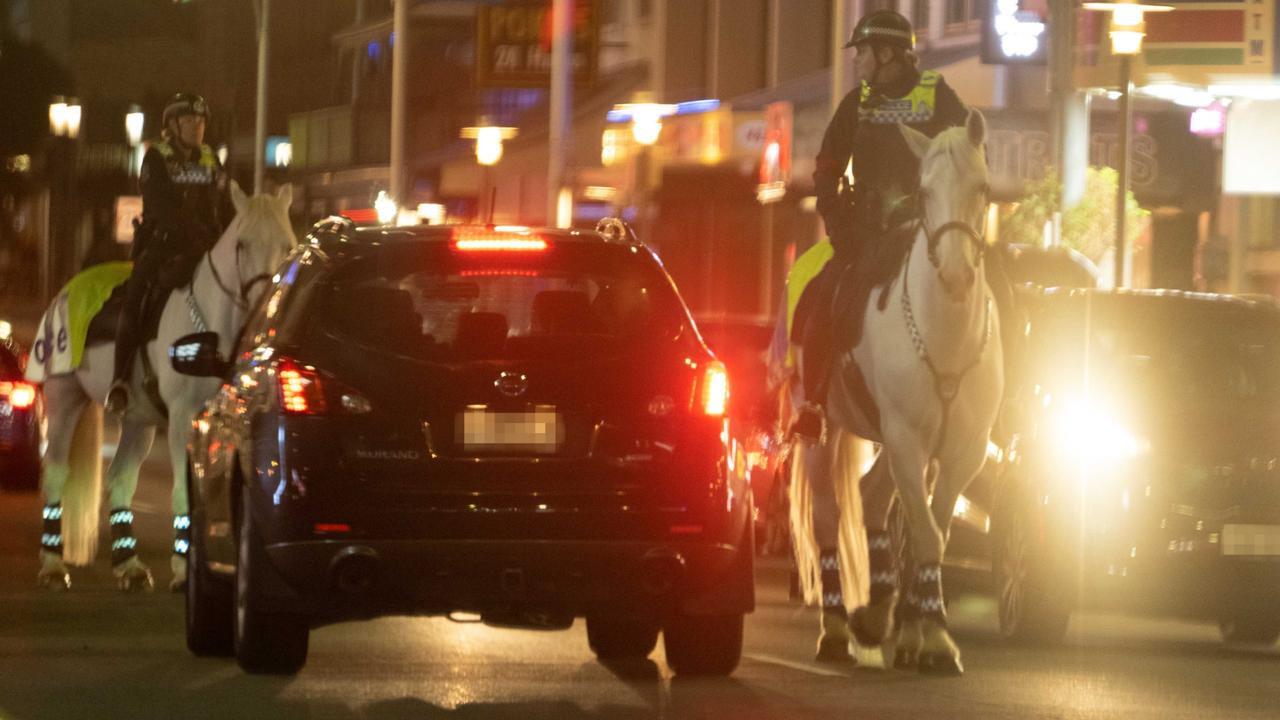 Police presence can be seen along Hindley Street on a Friday night in Adelaide, Kaurna Yarta. The Advertiser/ Morgan Sette