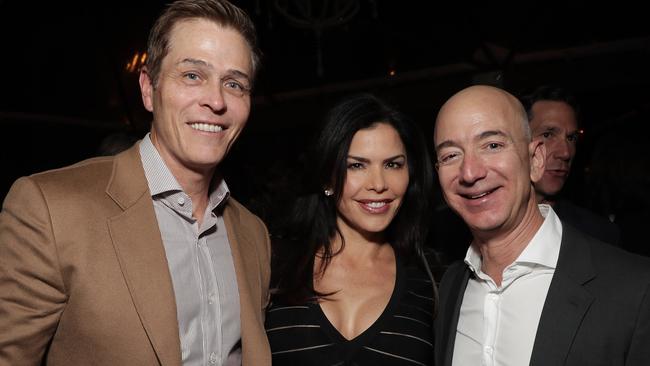 Patrick Whitesell, Lauren Sanchez and Amazon chief executive Jeff Bezos. Picture: Getty Images