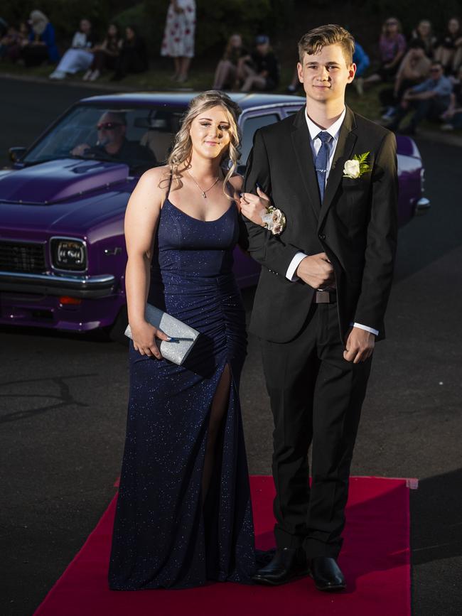 Madison Hartley and Ryan Fowler arrive at Harristown State High School formal at Highfields Cultural Centre, Friday, November 18, 2022. Picture: Kevin Farmer