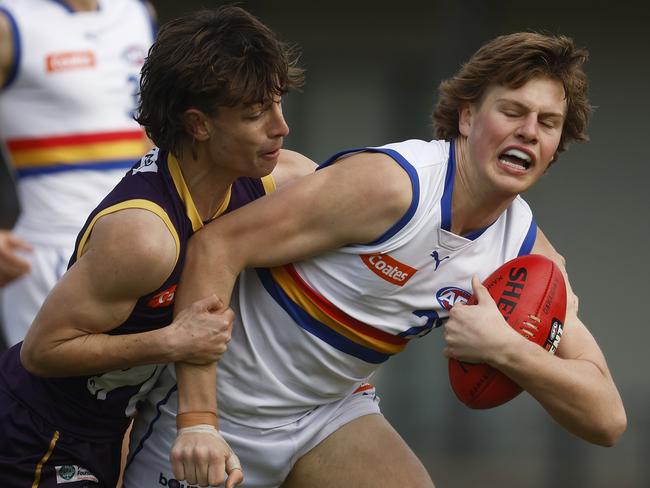 MELBOURNE, AUSTRALIA - AUGUST 05: Josh Smillie of the Ranges is tackled by Kynan Brown of the Chargers during the round 15 Coates Talent League Boys match between Oakleigh Chargers and Eastern Ranges at Warrawee Park on August 05, 2023 in Melbourne, Australia. (Photo by Daniel Pockett/AFL Photos/via Getty Images)