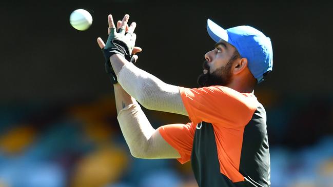 Indian captain Virat Kohli trains at the Gabba on Tuesday. Picture: AAP