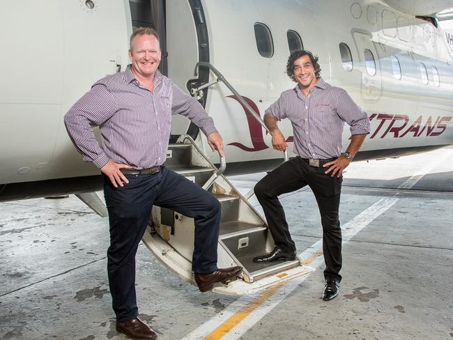 Skytrans owners Peter Collings and NRL star Johnathan Thurston. Picture: Skytrans