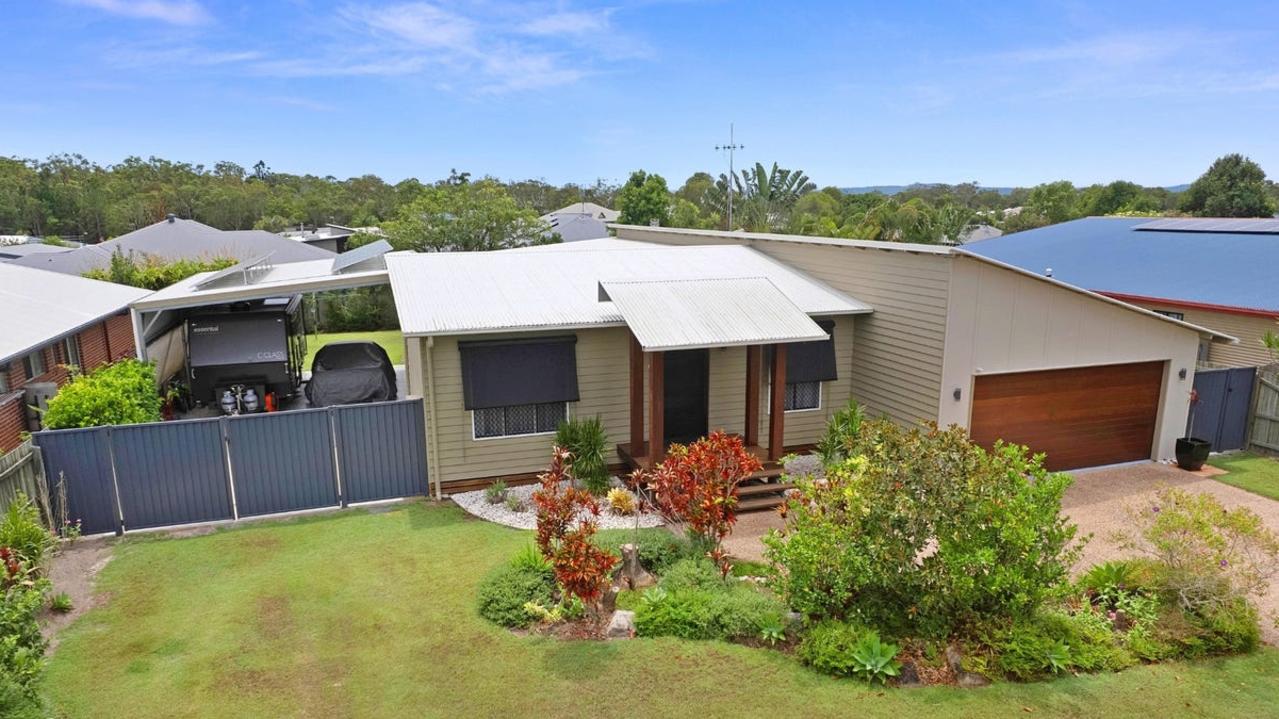 This four-bedroom house at 11 Lomandra Ave, Cooloola Cove, is for sale for $740,000.