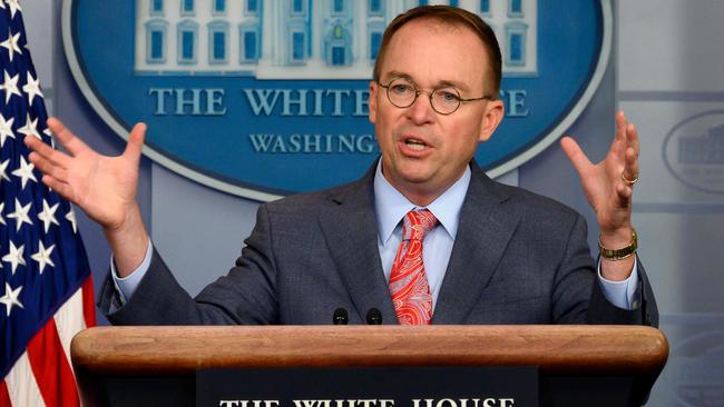 ‘That’s it, and that’s why we held up the money’: Mick Mulvaney on Friday. Picture: AFP