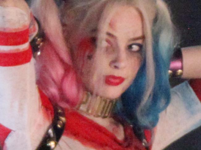 MUST CREDIT australscope GROUP RIGHTS ALL PLATFORMS 136928, EXCLUSIVE: Will Smith seen picking up Margot Robbie while filming 'Suicide Squad' in full costume. The Cast was filming on Bay street at 4am. The scene had fake rain that was pouring down on the stars and all seemed in good spirits about it. In movie Will Smith is seen as Deadshot, Margot Robbie as Harley Quinn, Jay Hernandez as El Diablo, Adam Beach, Adewale Akinnuoye-Agbaje as Killer Croc, Jai Courtney as Captain Boomerang, and Karen Fukuhara as Plastique. Will and Margot are re-united for the film after starring in the movie 'Focus' together, released in early 2015. Toronto, Canada - Saturday May 09, 2015. CANADA OUT Photograph: Â© PacificCoastNews. Los Angeles Office: +1 310.822.0419 sales@pacificcoastnews.com FEE MUST BE AGREED PRIOR TO USAGE