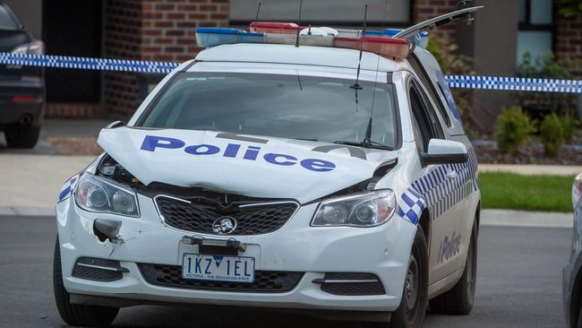 The rammed police car on Crestwood Rd in Greenvale. Picture: Jay Town