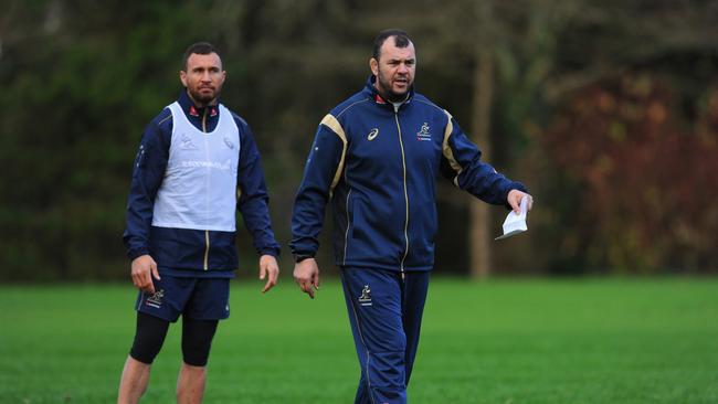 CARDIFF, WALES - NOVEMBER 04: Australia Wallabies head coach Michael Cheika (r) and Quade Cooper look on during a Wallabies training session at Treforest on November 4, 2014 in Cardiff, Wales. (Photo by Stu Forster/Getty Images)