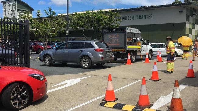 Traffic controllers have had their hands full all week in the Dan Murphy's carpark at Coffs Harbour.