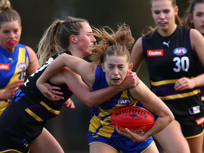 MELBOURNE, AUSTRALIA - JULY 22: Indi Stanley of the Western Jets is tackled during the round 15 Coates Talent League Girls match between Western Jets and Murray Bushrangers at Highgate Reserve on July 22, 2023 in Melbourne, Australia. (Photo by Graham Denholm/AFL Photos via Getty Images)