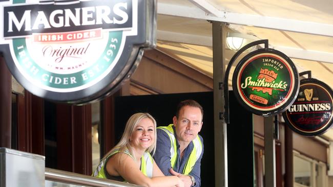 Tammy Wood and Cade Hopman at the site of the former Fiddlers Green bar. Photo: Richard Gosling