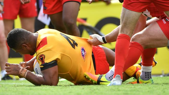 Nene Macdonald scores a try for PNG.