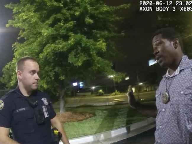 A screen grab taken from body camera video provided by Atlanta Police shows Rayshard Brooks speaking with Officer Garrett Rolfe. Picture: AP