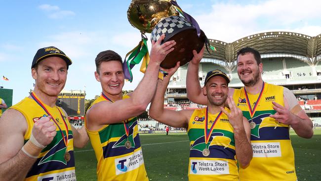 Patrick Giuffreda, Luke Thompson, Jimmy Toumpas and Jarrad Redden celebrates the Eagles’ grand final win. Picture: Sarah Reed