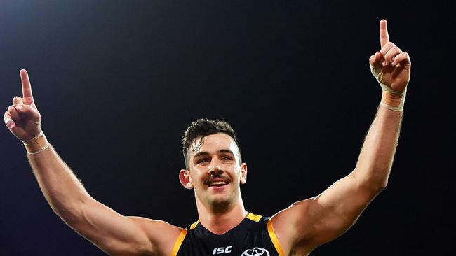 Crows captain Taylor Walker celebrates a goal during Adelaide’s comprehensive preliminary final win. Picture: Daniel Kalisz/Getty Images