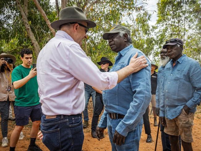 EAST ARNHEM, AUSTRALIA - AUGUST 04: Anthony Albanese Prime Minister of Australia meets with Yolngu Elder and Yothu Yindi Foundation CEO Djawa Yunupingu during Garma Festival 2022 at Gulkula on August 04, 2023 in East Arnhem, Australia.  The annual Garma festival is held at Gulkula, a significant ceremonial site for the Yolngu people of northeast Arnhem Land about 40km from Nhulunbuy on the Gove peninsula in East Arnhem. The festival is a celebration of Yolngu culture aimed at sharing culture and knowledge which also brings politicians and Indigenous leaders together to discuss issues facing Australia's Aboriginal and Torres Strait Islander people. The gathering takes on a special significance in 2023 with a constitutional referendum on the Voice to Parliament to be held later in the year. (Photo by Tamati Smith/Getty Images)