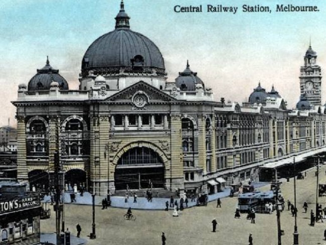 This postcard shows Flinders Street Station in 1910, just one year after it was built. The station is soon to be repainted this original colour. Picture: State Library of Victoria.