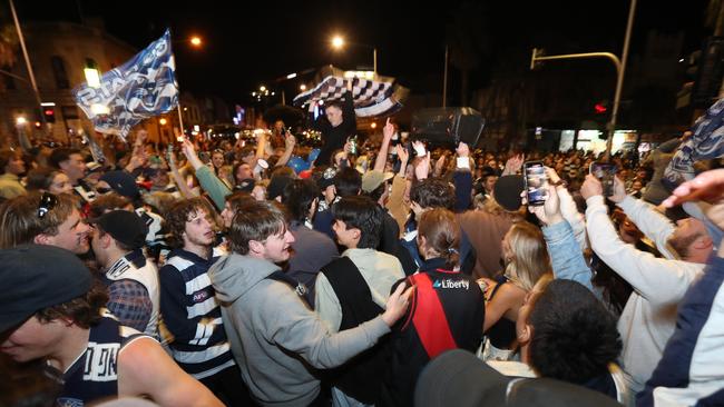 Street celebrations in Ryrie Street after Geelong Cats won the 2022 premiership. Picture: Alan Barber