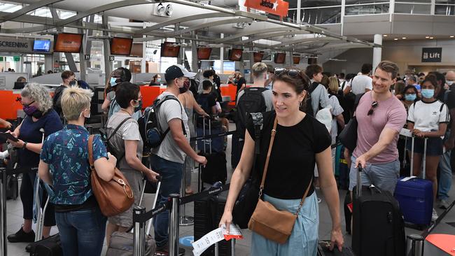 Passengers wait to check in at the Domestic terminal at Sydney Airport in Sydney. Picture: NCA NewsWire/Joel Carrett