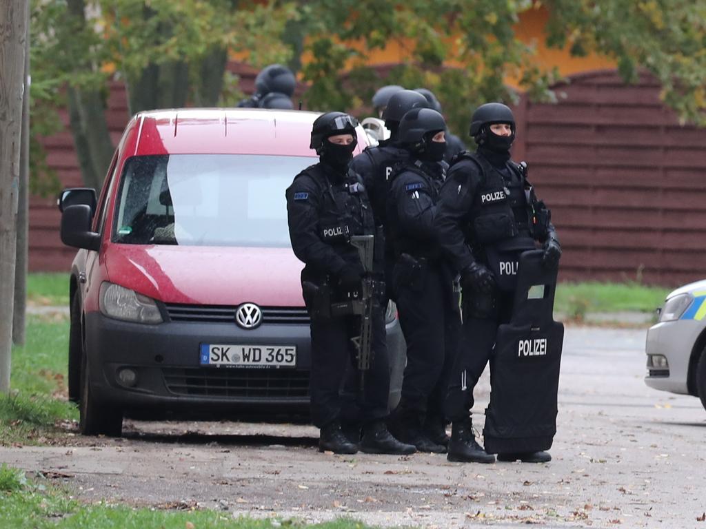 Police at the scene. Picture: AP