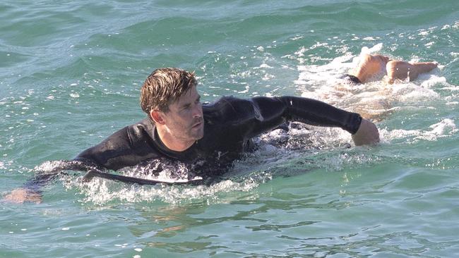 Chris Hemsworth surfing in Byron Bay. Picture: File